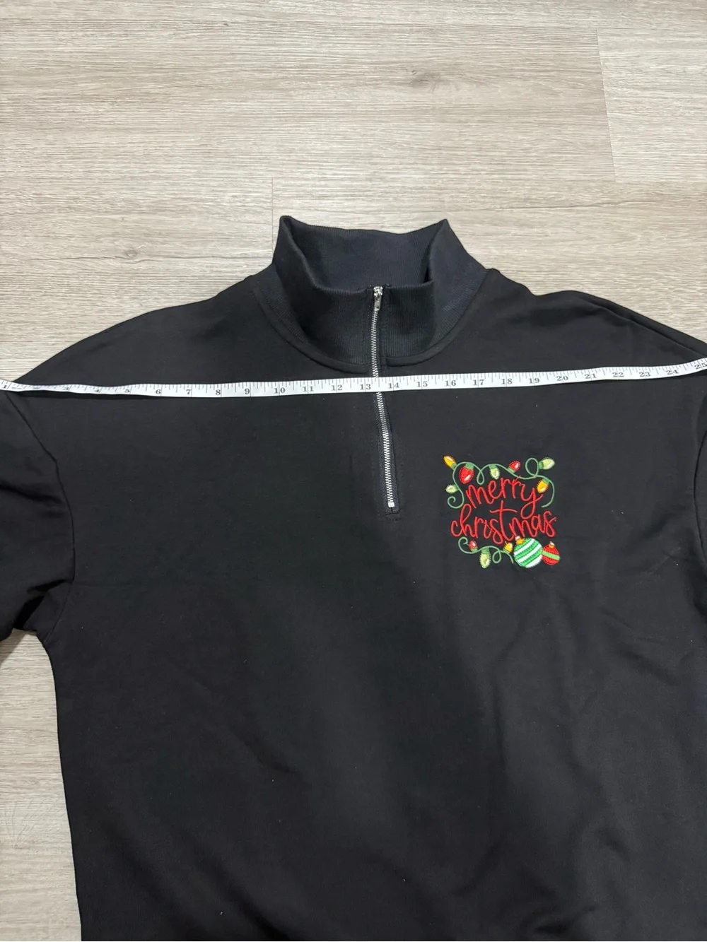 Women's Black Half-Zip Sweater with Festive Chest Embroidery